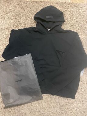 Fear of God Essentials Black Pullover Hoodie with Subtle Logo